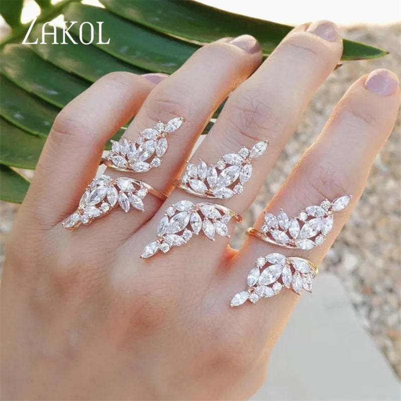 ZAKOL Fashion White Zirconia Leaf Open Rings for Girl Trendy Crystal Wing Finger Adjust Ring Party Women Jewelry
