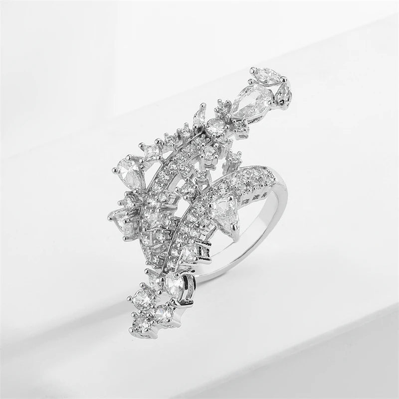 ZAKOL Fashion White Zirconia Leaf Open Rings for Girl Trendy Crystal Wing Finger Adjust Ring Party Women Jewelry