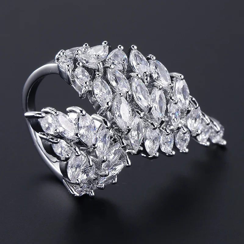 ZAKOL Fashion White Zirconia Leaf Open Rings for Girl Trendy Crystal Wing Finger Adjust Ring Party Women Jewelry
